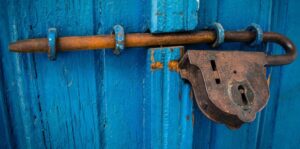 old-lock-on-blue-door